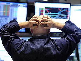 ������� ��������� �� ������������ ������� Dow Jones. ���� &copy;AP