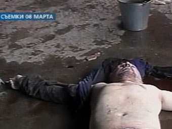 Тело Аслана Масхадова, кадр оперативной съемки из досье Первого канала