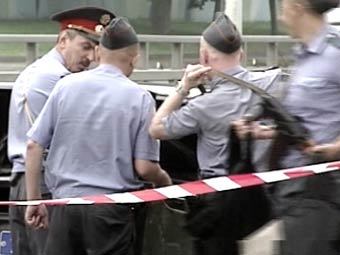 Сотрудники милиции на месте одного из недавних нападений на инкассаторов, кадр НТВ, архив