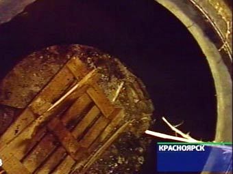 Коллектор, в котором были найдены останки детей, кадр НТВ, архив