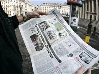 Номер газеты France Soir с карикатурами на пророка Мухаммеда. Фото AFP