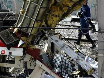 Последствия теракта на вокзале в Мадриде, март 2004 года. Фото (c)AFP Последствия теракта на вокзале в Мадриде, март 2004 года. Фото (c)AFP