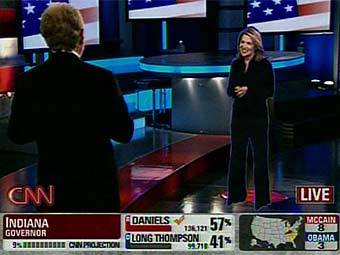 Голограмма Джессики Йелин (справа). Кадр телеканала CNN.