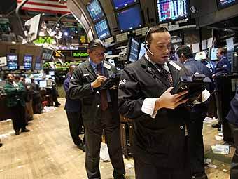 Трейдеры на NYSE. Фото ©AFP