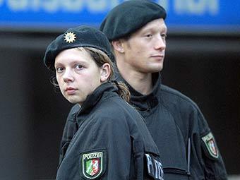 Немецкие полицейские. Фото (c)AFP Немецкие полицейские. Фото (c)AFP