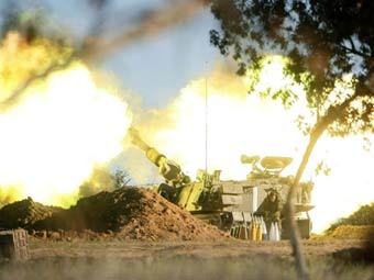 Израильская артиллерия ведет огонь по сектору Газа. Фото ©AFP