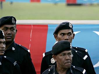 Малазийские полицейские. Фото ©AFP