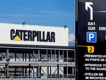 ����� Caterpillar � ��������. ���� &copy;AFP