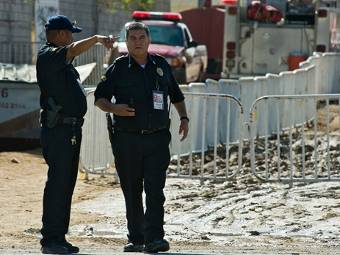 Полиция у сгоревшего детского сада. Фото ©AFP 