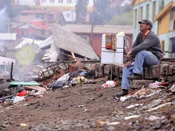 Последствия землетрясения в Чили. Фото (c)AFP Последствия землетрясения в Чили. Фото (c)AFP