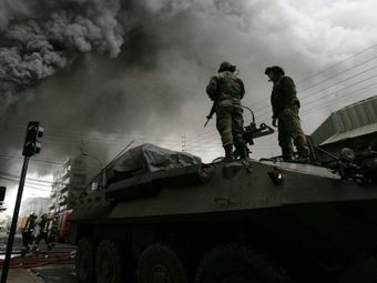 Военный патруль в Консепсьоне. Фото (c)AFP Военный патруль в Консепсьоне. Фото (c)AFP