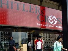�� ����� � �������� Hitler's Cross ("������������ �����") � �����. ���� (c)AP, �����