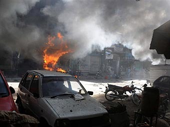 Последствия теракта в Лахоре. Фото (c)AFP Последствия теракта в Лахоре. Фото (c)AFP