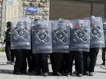 Израильские полицейские в Восточном Иерусалиме. Фото (c)AFP Израильские полицейские в Восточном Иерусалиме. Фото (c)AFP