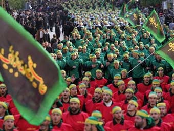 Сторонники 'Хизбаллы'. Фото (c)AFP Сторонники 'Хизбаллы'. Фото (c)AFP