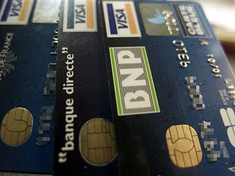 Карты Visa. Фото (c)AFP Карты Visa. Фото (c)AFP