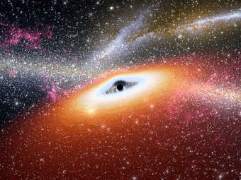 Сверхмассивная черная дыра в центре галактики глазами художника. Изображение NASA