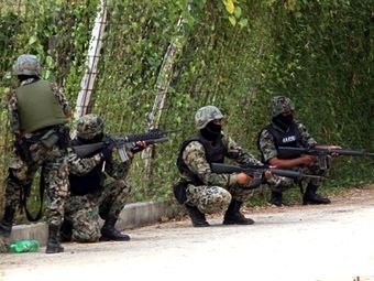 Служащие ВМФ Мексики. Архивное фото (c)AFP Служащие ВМФ Мексики. Архивное фото (c)AFP