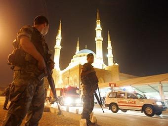 Ливанские солдаты охраняют могилу Харири. Фото (c)AFP Ливанские солдаты охраняют могилу Харири. Фото (c)AFP