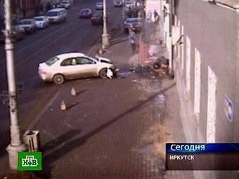 Место ДТП в Иркутске. Кадр видеозаписи камеры наружного наблюдения, переданный в эфире НТВ