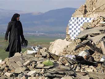Последствия землетрясения в Иране. Архивное фото (c)AFP Последствия землетрясения в Иране. Архивное фото (c)AFP