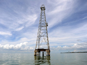 Нефтяная вышка в Венесуэле. Фото (c)AFP Нефтяная вышка в Венесуэле. Фото (c)AFP