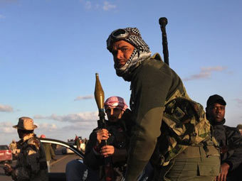 Ливийские оппозиционеры. Фото (c)AFP Ливийские оппозиционеры. Фото (c)AFP