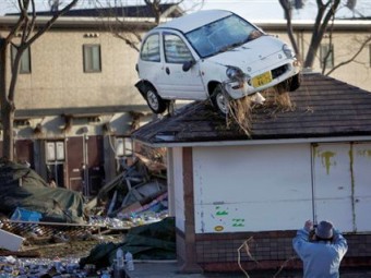 Последствия землетрясения в Японии. Фото (c)AP Последствия землетрясения в Японии. Фото (c)AP