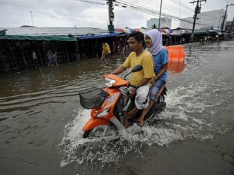 Последствия шторма в Таиланде. Фото (c)AFP Последствия шторма в Таиланде. Фото (c)AFP