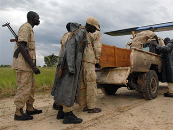 Похороны бойца SPLA. Фото (c)AFP Похороны бойца SPLA. Фото (c)AFP