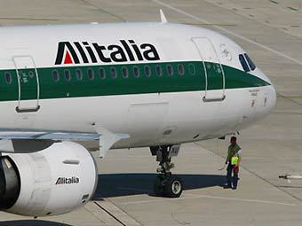 Самолет Alitalia. Фото (c)AFP, архив Самолет Alitalia. Фото (c)AFP, архив