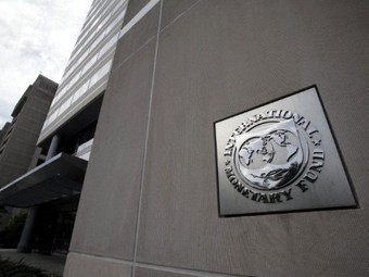 Вывеска на здании МВФ. Архивное фото (c)AFP Вывеска на здании МВФ. Архивное фото (c)AFP