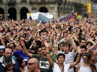 Акция протеста в Барселоне. Фото (c)AP Акция протеста в Барселоне. Фото (c)AP