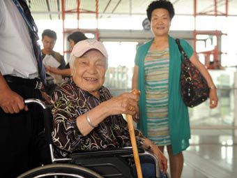 Вылетающие на Тайвань туристы. Фото с сайта China Daily Вылетающие на Тайвань туристы. Фото с сайта China Daily