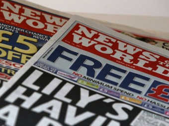 Передовица News of the World. Фото (c)AFP Передовица News of the World. Фото (c)AFP