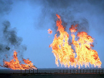 Нефтяное поле в Ираке. Фото (c)AFP Нефтяное поле в Ираке. Фото (c)AFP