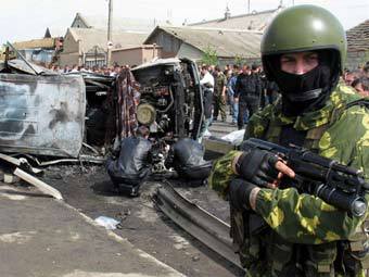 На месте теракта в одной из республик Северного Кавказа. Фото (c)AFP На месте теракта в одной из республик Северного Кавказа. Фото (c)AFP