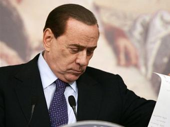 Сильвио Берлускони на пресс-конференции после заседания Совета министров. Фото ©AP