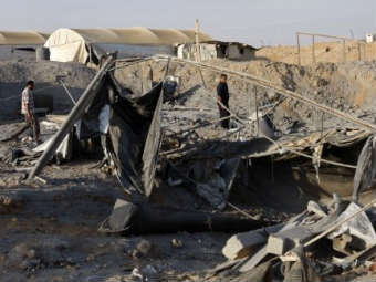 Последствия удара ВВС Израиля по сектору Газа 2 августа 2011 года. Фото (c)AFP Последствия удара ВВС Израиля по сектору Газа 2 августа 2011 года. Фото (c)AFP
