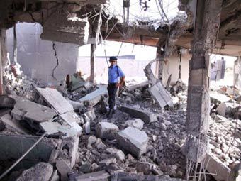 Разрушенный дом в центре Злитана. Фото (c)AFP Разрушенный дом в центре Злитана. Фото (c)AFP