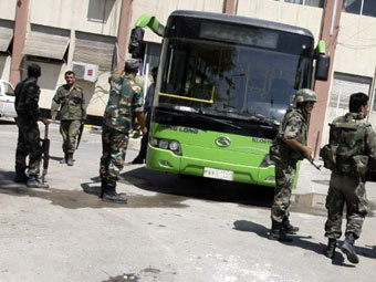 Сирийские солдаты. Фото (c)AFP Сирийские солдаты. Фото (c)AFP