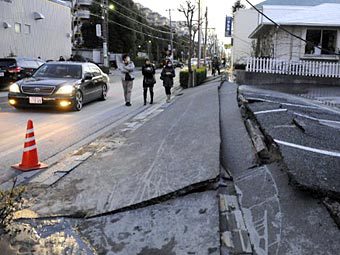 Последствия землетрясения 11 марта 2011 года в Японии. Фото (c)AFP Последствия землетрясения 11 марта 2011 года в Японии. Фото (c)AFP