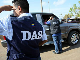 Сотрудники DAS. Фото ©AFP