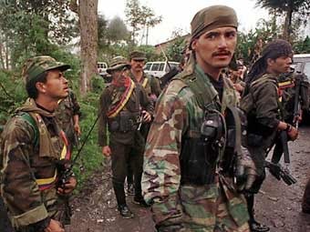 Боевики FARC. Фото (c)AFP Боевики FARC. Фото (c)AFP
