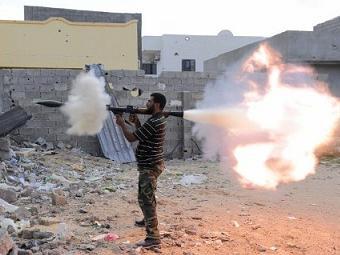 Боец с ручным гранатометом. Фото (c)AP Боец с ручным гранатометом. Фото (c)AP
