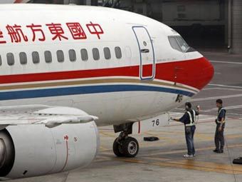 Самолет China East Airlines. Фото (c)AFP Самолет China East Airlines. Фото (c)AFP