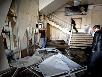 На месте взрыва в Дамаске 23 декабря 2011 года. Фото ©AFP