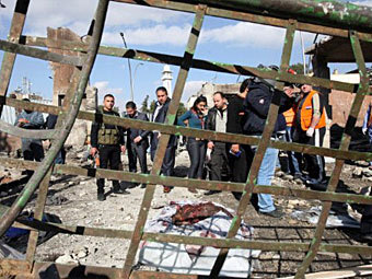 На месте взрыва в Дамаске 23 декабря 2011 года. Фото ©AFP