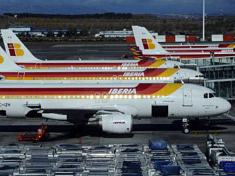 Самолеты авиакомпании Iberia. Фото (c)AFP Самолеты авиакомпании Iberia. Фото (c)AFP