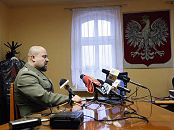 Пресс-конференция Миколая Пшибыла 9 января 2012 года. Фото (c)AFP Пресс-конференция Миколая Пшибыла 9 января 2012 года. Фото (c)AFP
